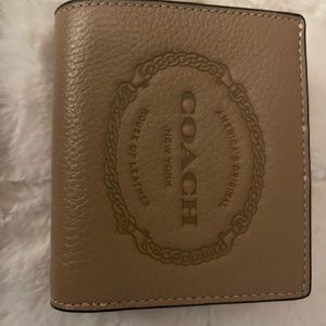 Woman's coach leather wallet.